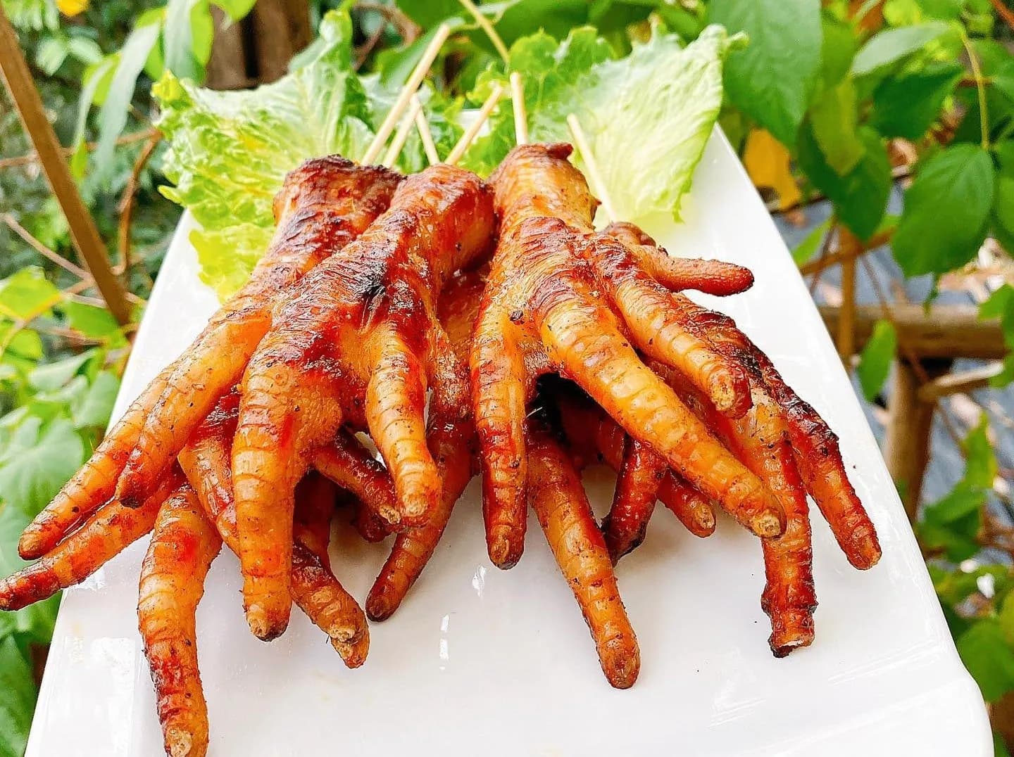 Grilled chicken feet - unique Hanoi snacks because of their deliciousness