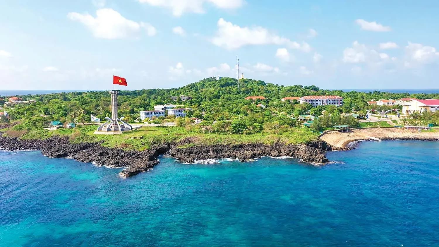 A picturesque view of Quang Tri coastline with a national flag.