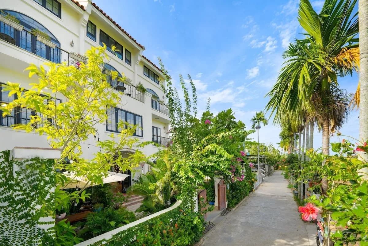Maison Fleur's lush surroundings, a hotel known for its nature-inspired architecture.